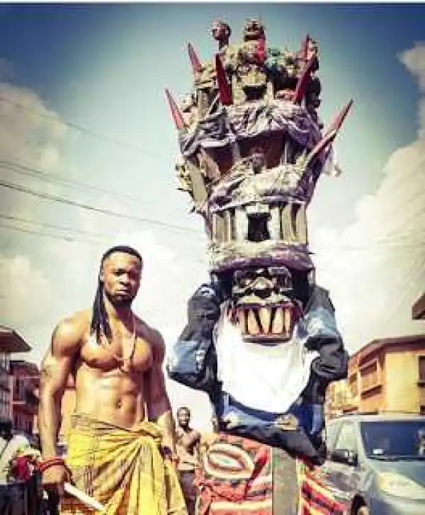 Singer Flavour and Huge Masquerade in Adorable New Photo